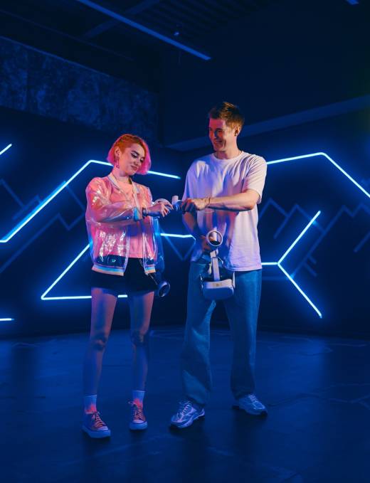 A man and a young woman prepared for the vr game.